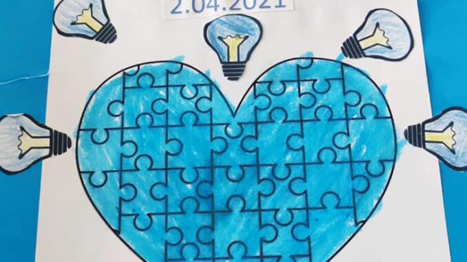 Plakat niebieskie serce na Dzień Zutyzmu